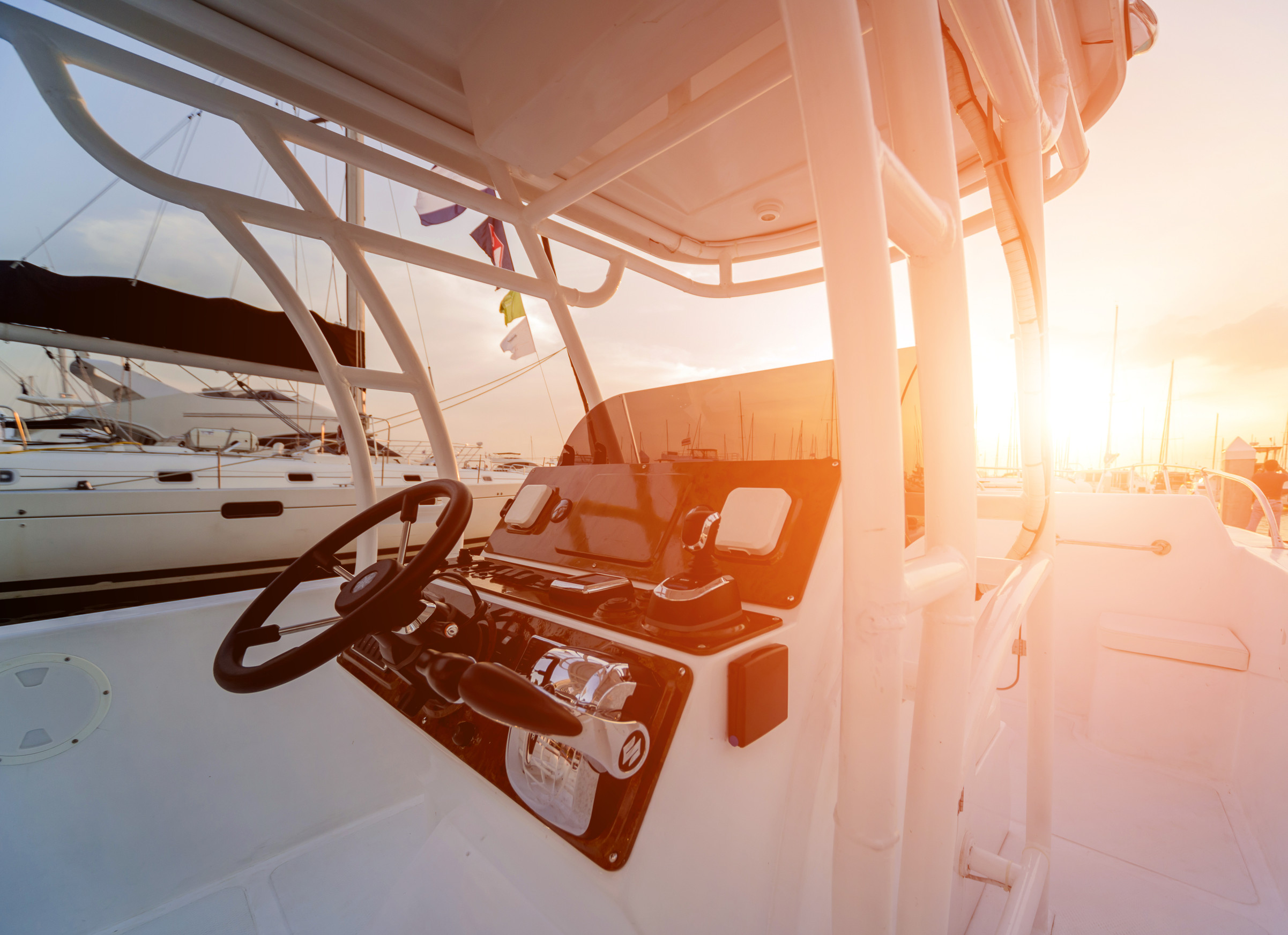 A modern speed boat yacht steering wheels.